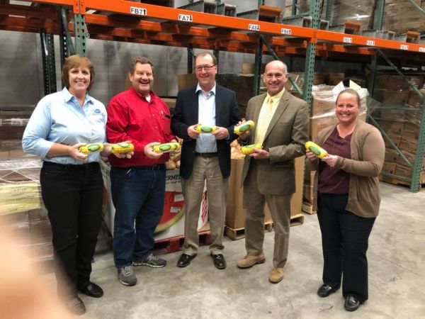 CORN FARMERS FEEDING THE HUNGRY, DONATE PORK TO MIDWEST FOODBANK