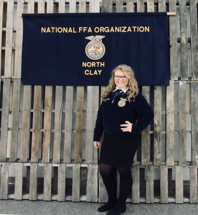 breanne in front of ffa flag