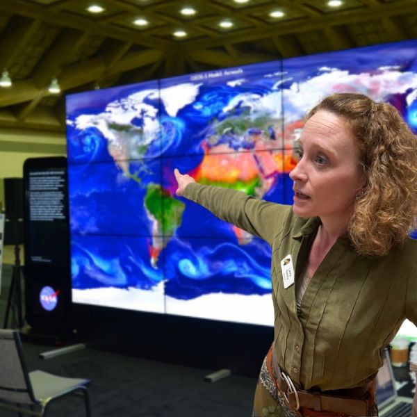 Laura Gentry in front of NASA Hyperwall